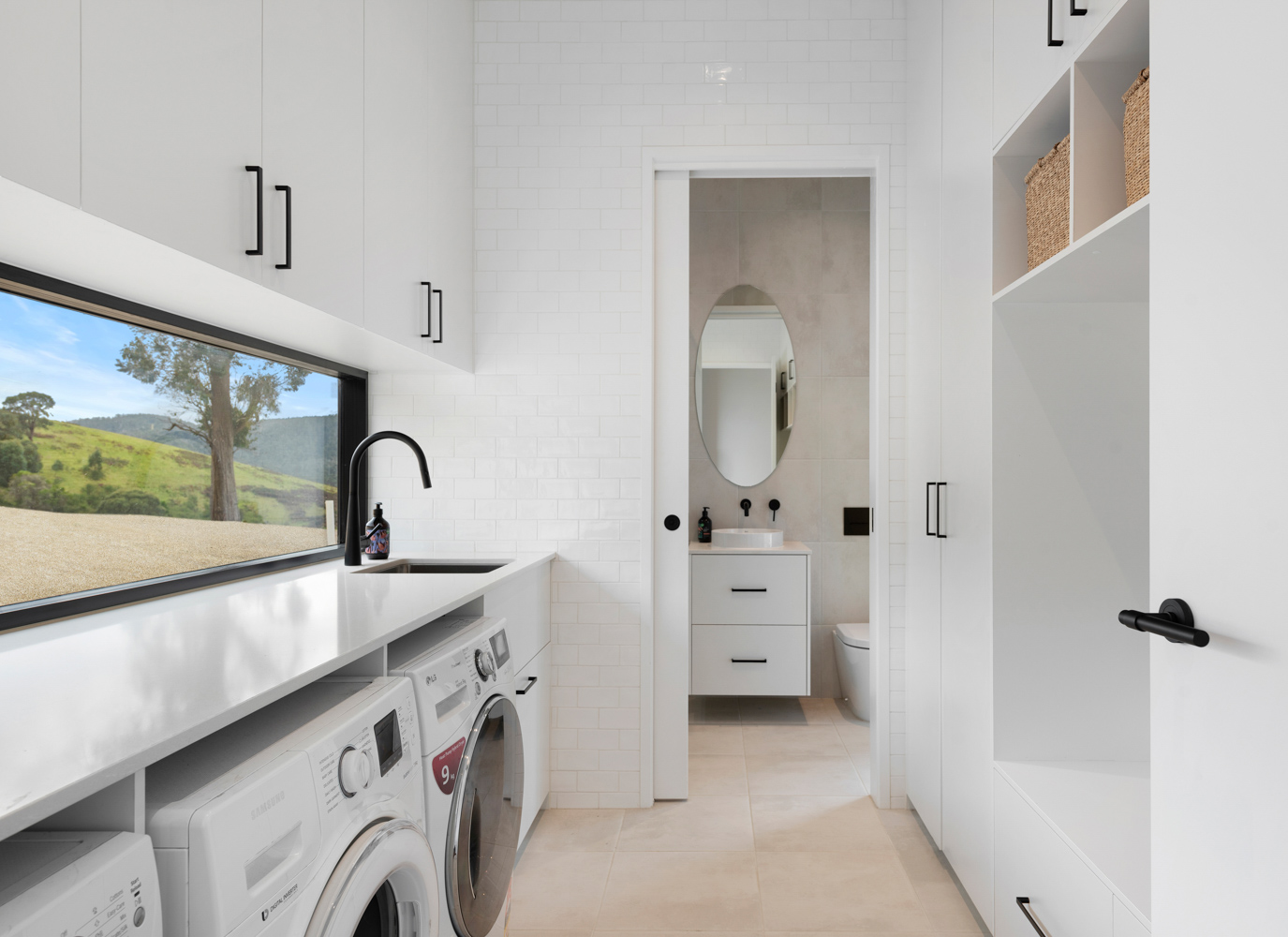 Custom laundry cabinetry by Dodge Cabinets.