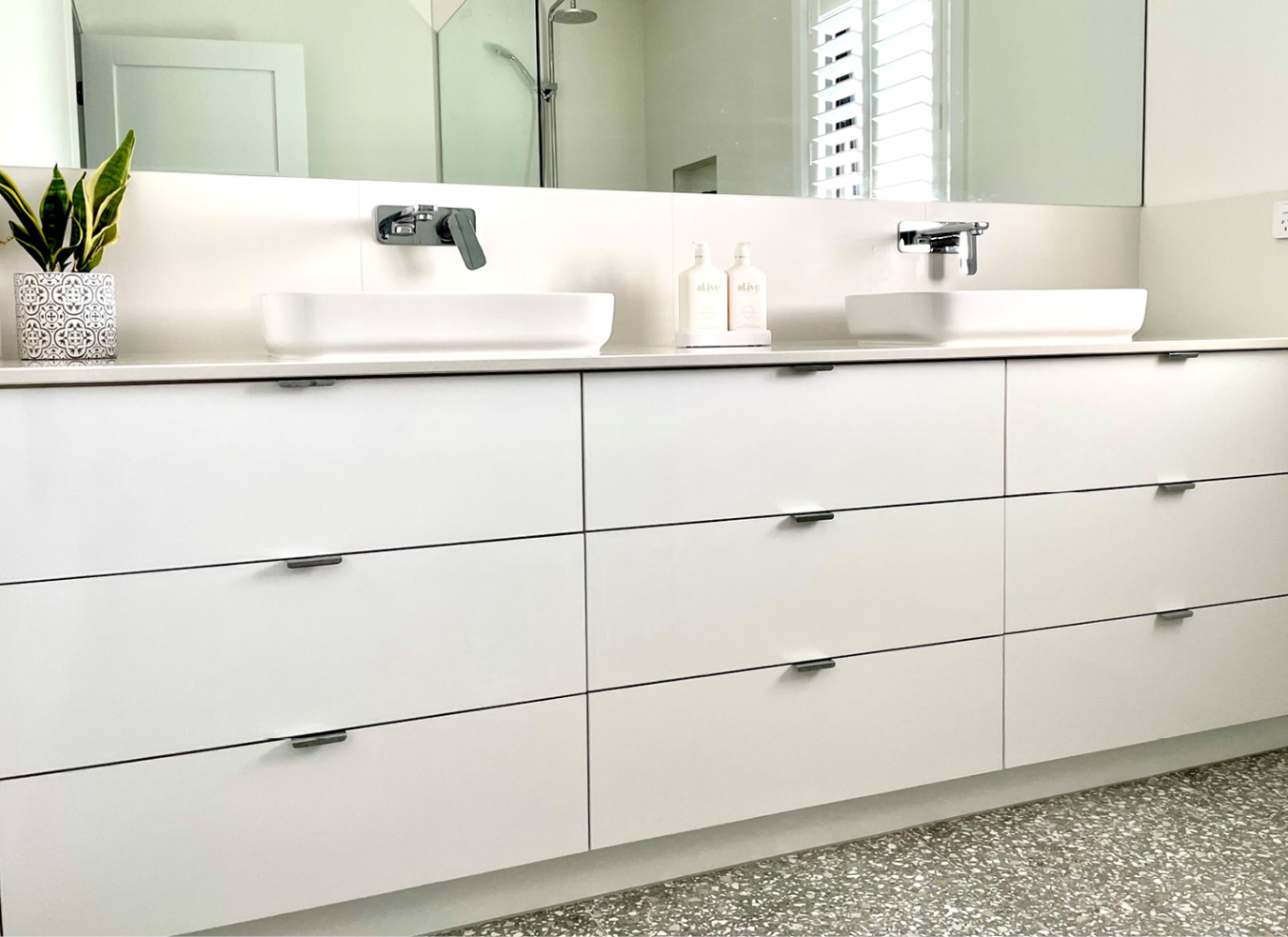 Custom bathroom vanity painted in 2-Pac polyurethane topped with WK Quantum Quartz stone.