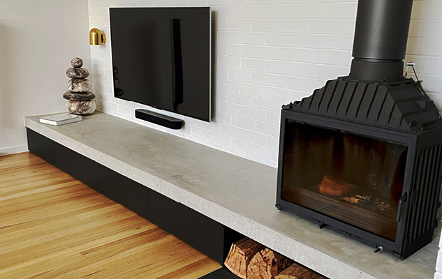 Polytec Black Wenge laminate doors on custom TV cabinet and fire place surround
