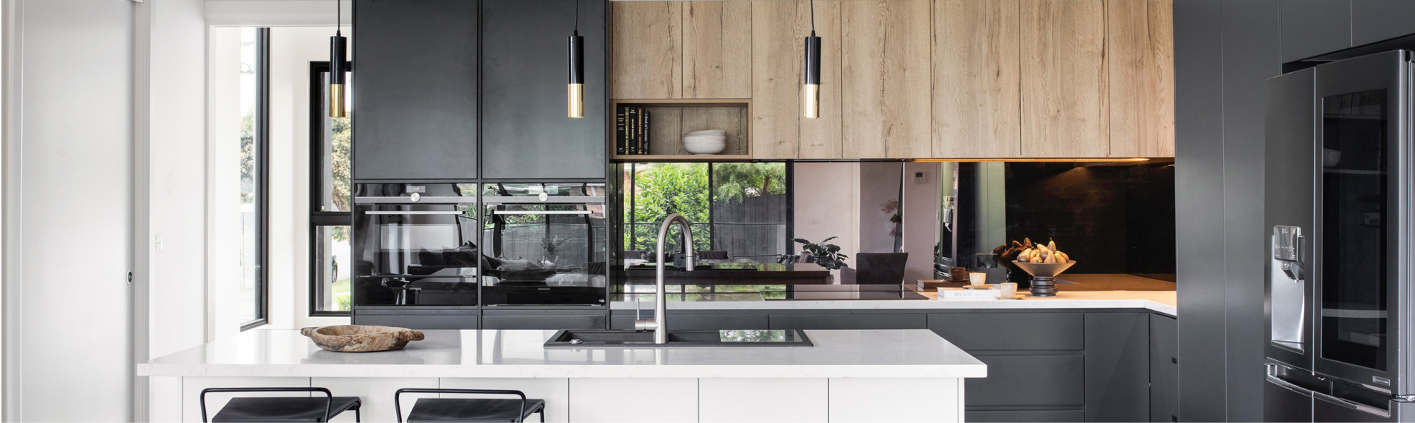 Dodge Cabinets' resourceful designers will help you create a design that suits your individual needs and space in your home. This kitchen features Nikpol Natural Halifax Oak, 2 Pac polyurethane painted cabinets complimented by WK Quantum Quartz benchtops.