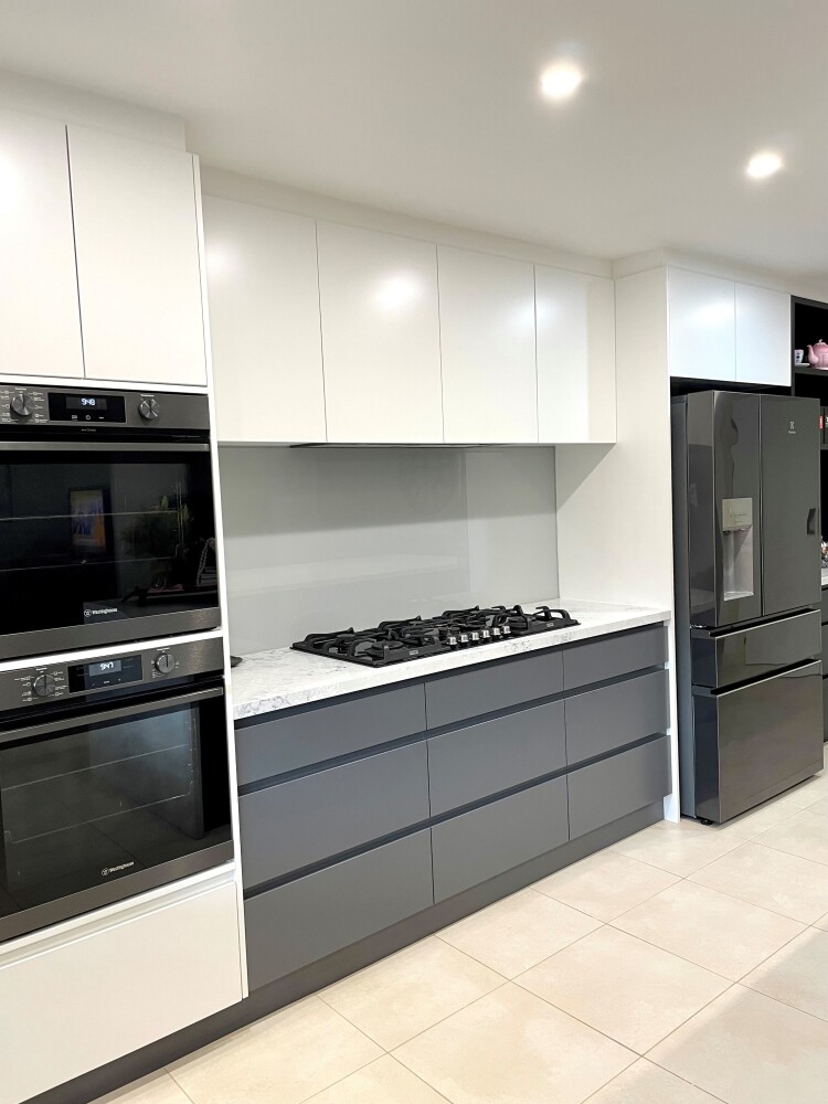 alt="Large island bench, extensive pantry storage and practical design. A beautiful result for this kitchen renovation in the Yarra Ranges."